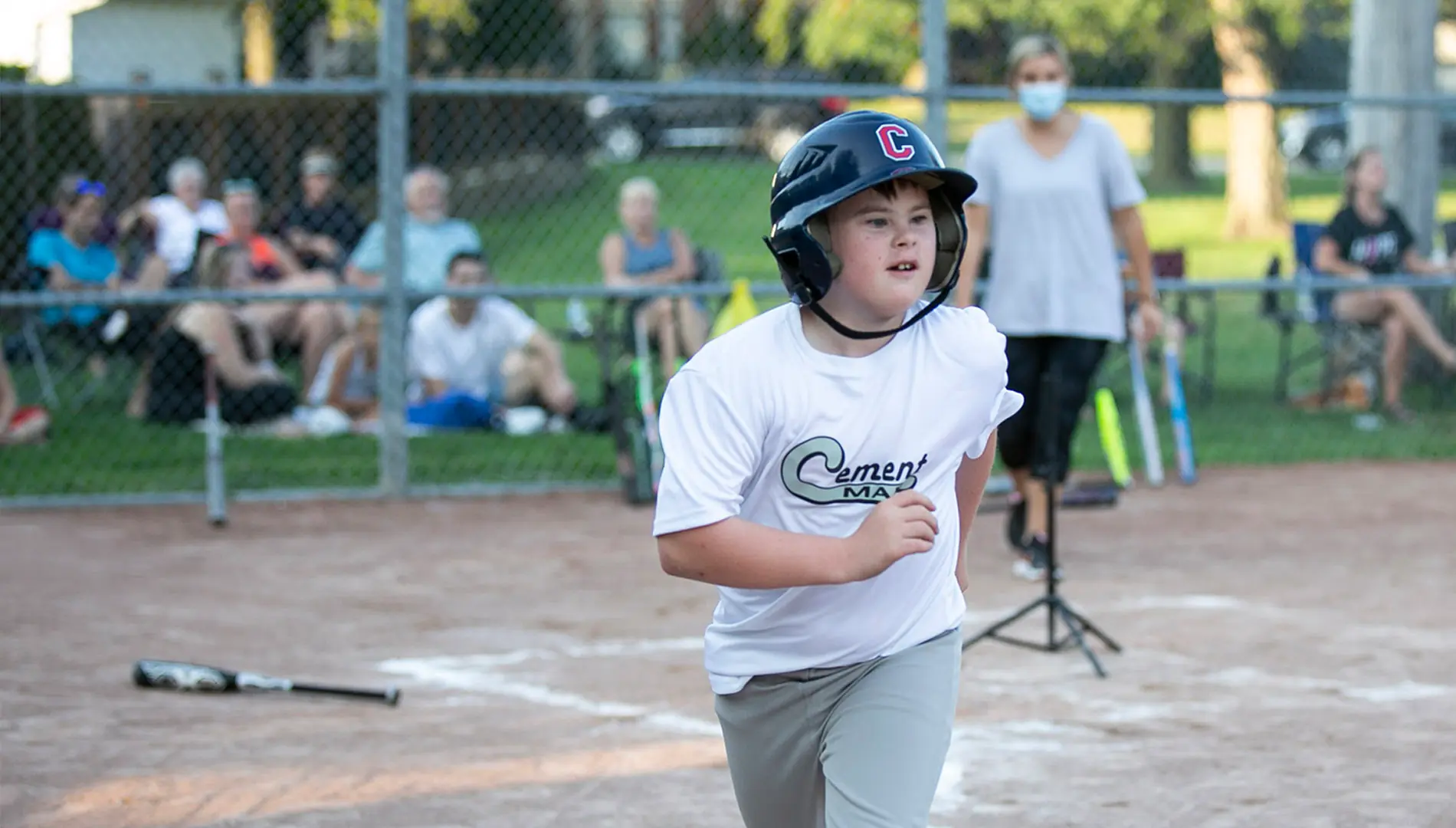 A child playing baseball